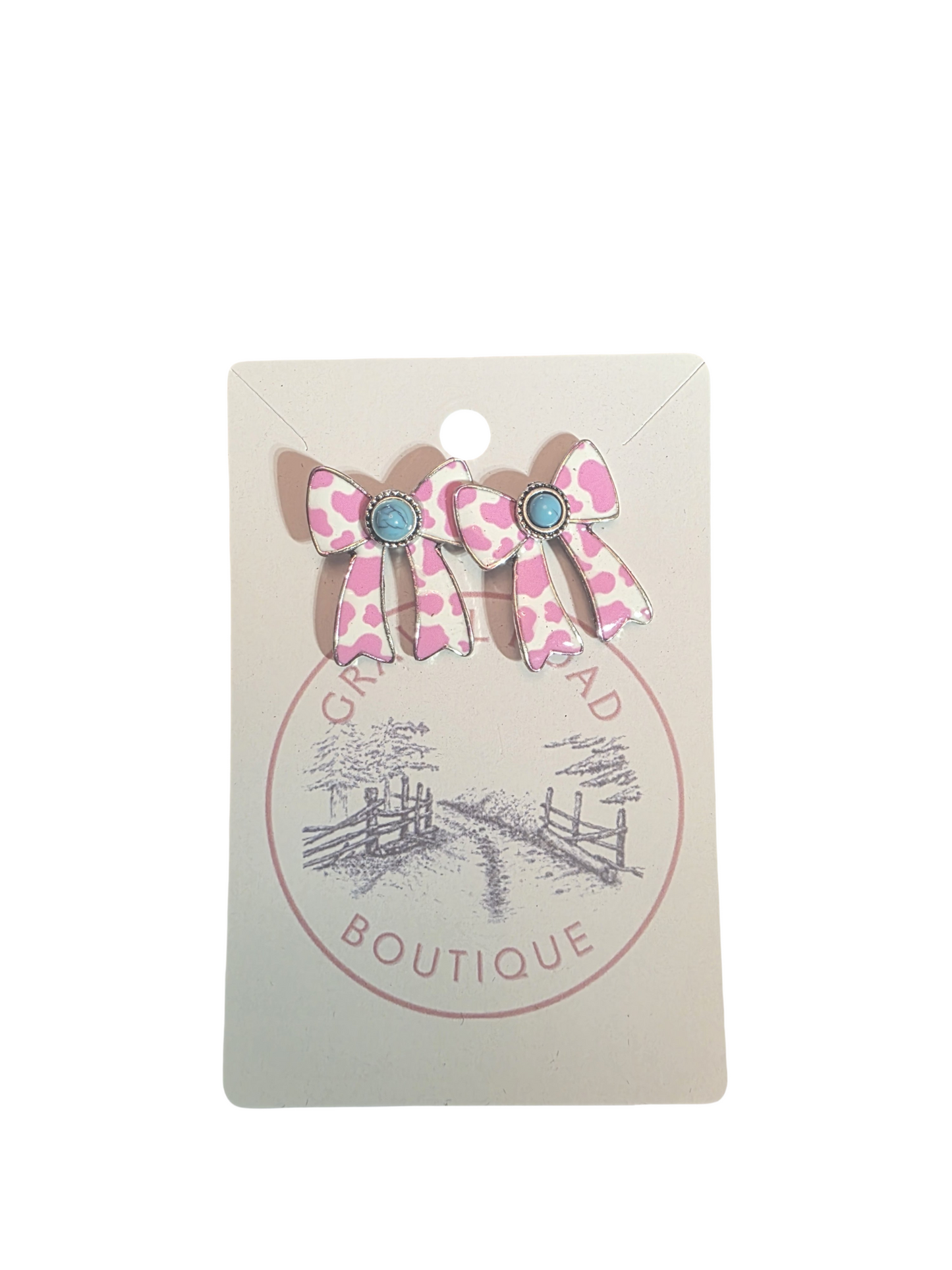 COW PRINT BOW EARRINGS